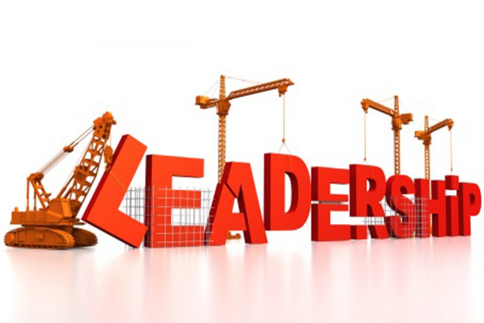 graphic of the word leadership being assembled by cranes